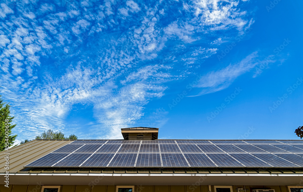 Fototapeta premium Solar panels installed on the top of a metal roof