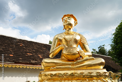 Upagupta monk in Wat Phra That Doi Kham (Temple of the Golden Mountain) Chiang Mai Thailand photo