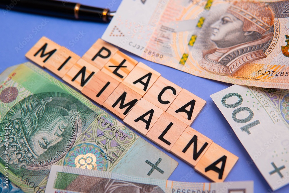 Inscription Płaca minimalna which means Minimum wage in polish. Concept showing rise of minimum wage in poland Inscription Płaca minimalna which means Minimum wage in polish. Concept showing rise of minimum wage in poland