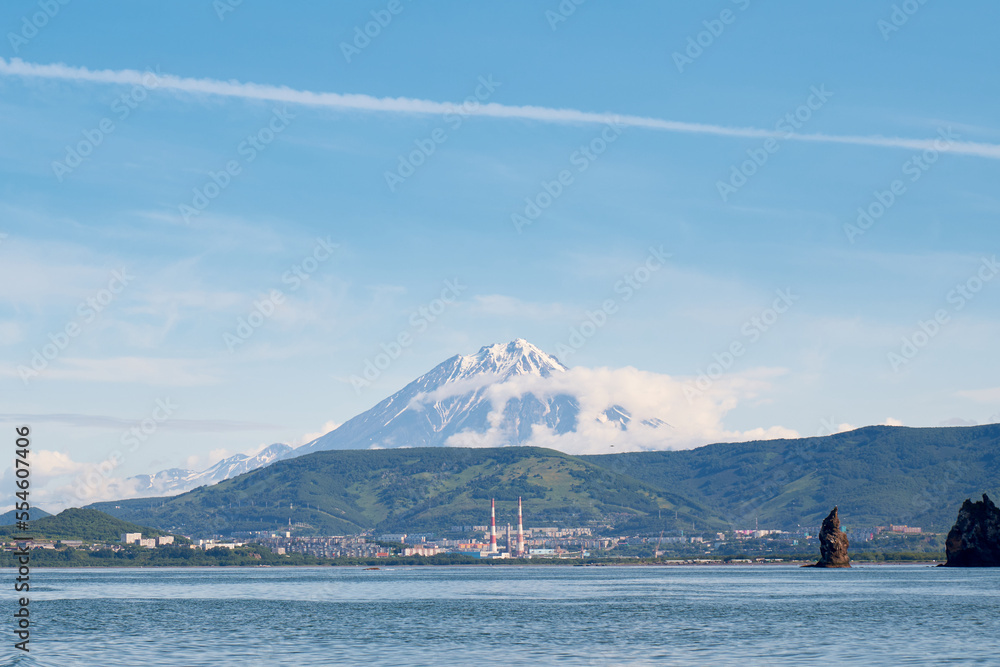 Petropavlovsk Kamchatsky city in front of Avacha volcano. Landscape view from the Pacific ocean. Kamchatka