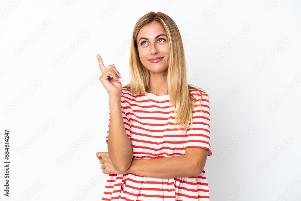 Blonde Uruguayan girl isolated on white background pointing up a great idea Blonde Uruguayan girl isolated on white background pointing up a great idea