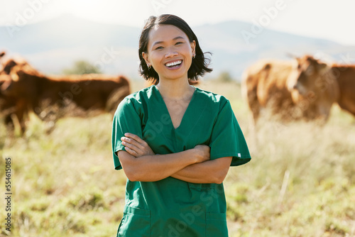 Woman, vet or arms crossed on cow farm, dairy agriculture field or beef produce countryside in wellness goals or vaccine innovation. Portrait, smile or happy animal doctor in bovine cattle healthcare © Kay A/peopleimages.com