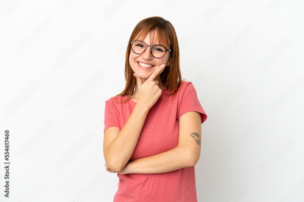 Redhead girl isolated on white background happy and smiling Redhead girl isolated on white background happy and smiling