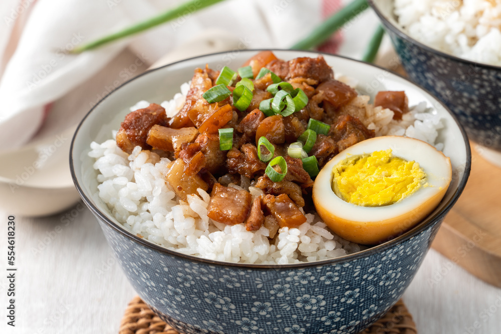 Braised meat over cooked rice, famous and delicious street food in Taiwan. Braised meat over cooked rice, famous and delicious street food in Taiwan.