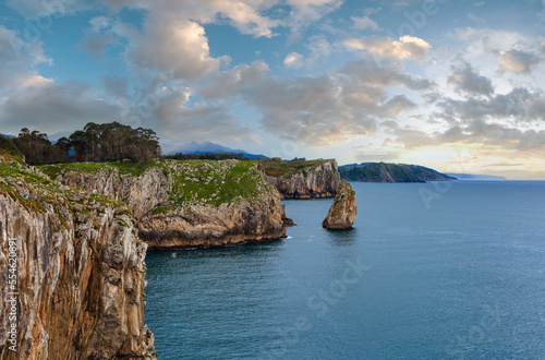 Bay of Biscay summer rocky coast view with rock formation near shore, Spain, Asturias.