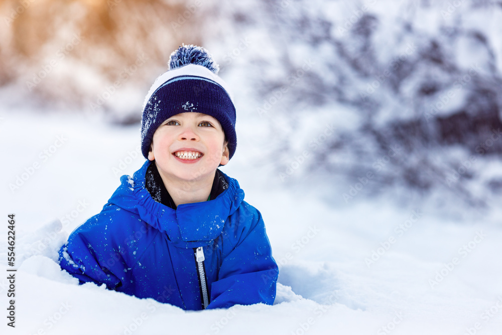 Cute little boy having fun in the snow Cute little boy having fun in the snow