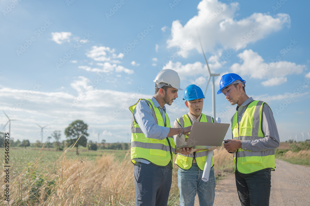 Asian engineers working in fieldwork outdoor. Workers walking and