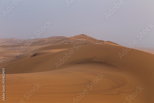 Desert off the coast of the Atlantic Ocean. Beautiful sunset. Walvis Bay. Swakopmund  Namibia.