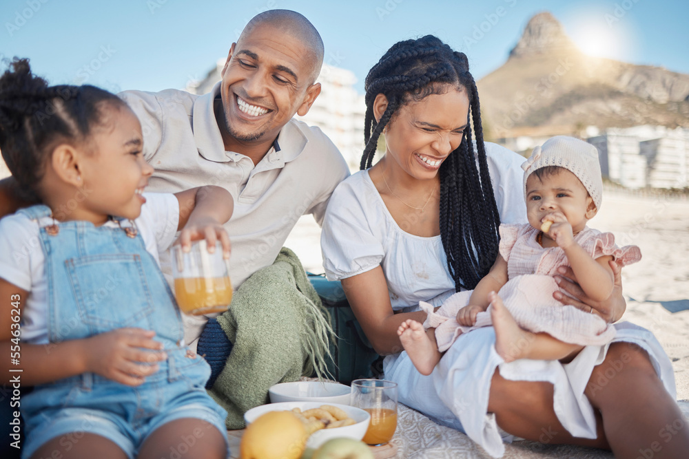 Fototapeta premium Black family, happy and food picnic on beach with kids to enjoy summer outing together in Cape Town, South Africa. Children, mother and dad relax on sand in nature for bonding in sunshine.