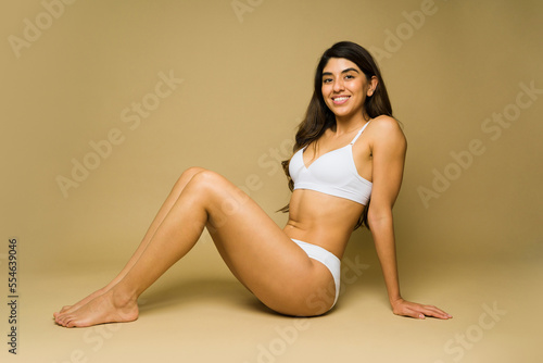 Athletic woman looking happy with her cosmetic procedure