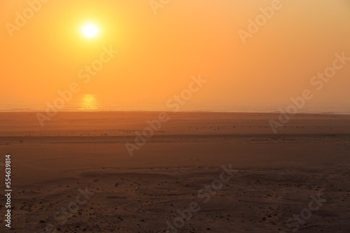 Desert off the coast of the Atlantic Ocean. Beautiful sunset. Walvis Bay. Swakopmund, Namibia. © Tomasz Wozniak