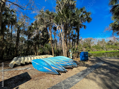 Canoes lined up for people to rent at a state park in Florida.