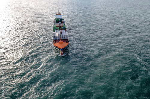 Impressive aerial wide angle view of a container ship crossing the oceans © Image'in