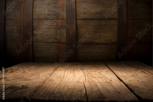 mug of beer  wheat ears  hops and beer barrel on a wooden background. High quality photo