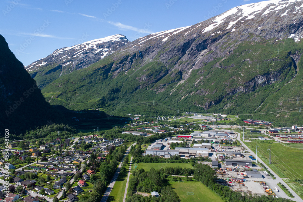 Aerial view of Sunndalsøra village in Norway, surrounded by beautiful mountains