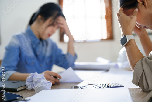 Engineering construction concept, Two engineers stressful while sketching blueprint of new project