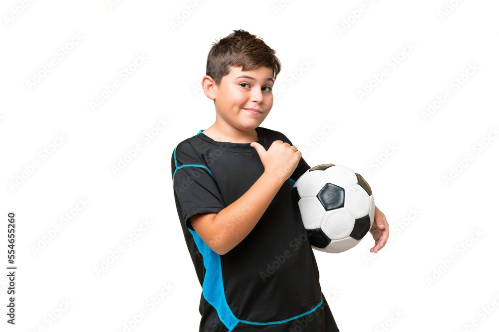 Little caucasian football player kid over isolated chroma key background proud and self-satisfied Little caucasian football player kid over isolated chroma key background proud and self-satisfied