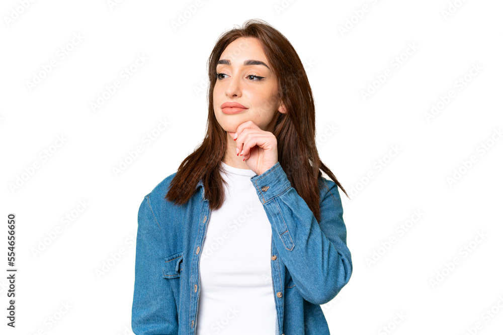 Young caucasian woman over isolated chroma key background thinking an idea while looking up Young caucasian woman over isolated chroma key background thinking an idea while looking up