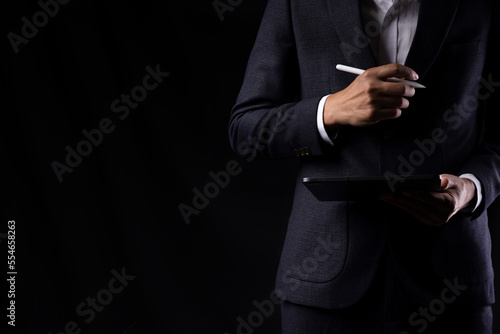 Businessman working with modern digital tablet