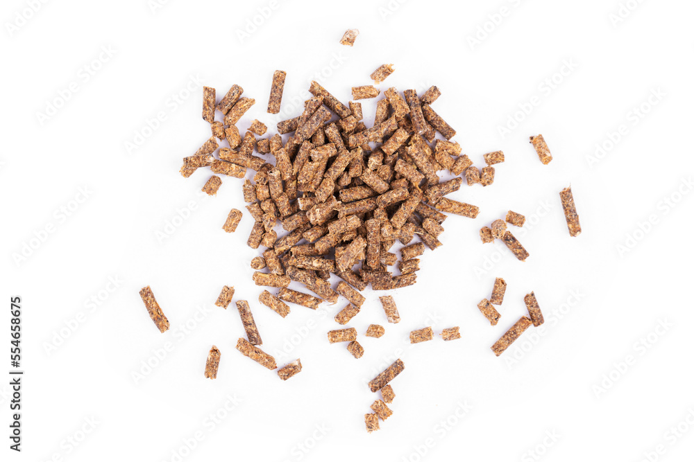 Animal feed. Sunflower granulated feed on white background, close-up
