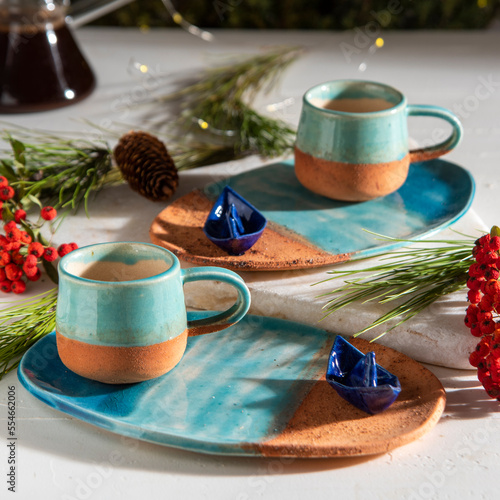 Ceramic Turkish coffee cups on table