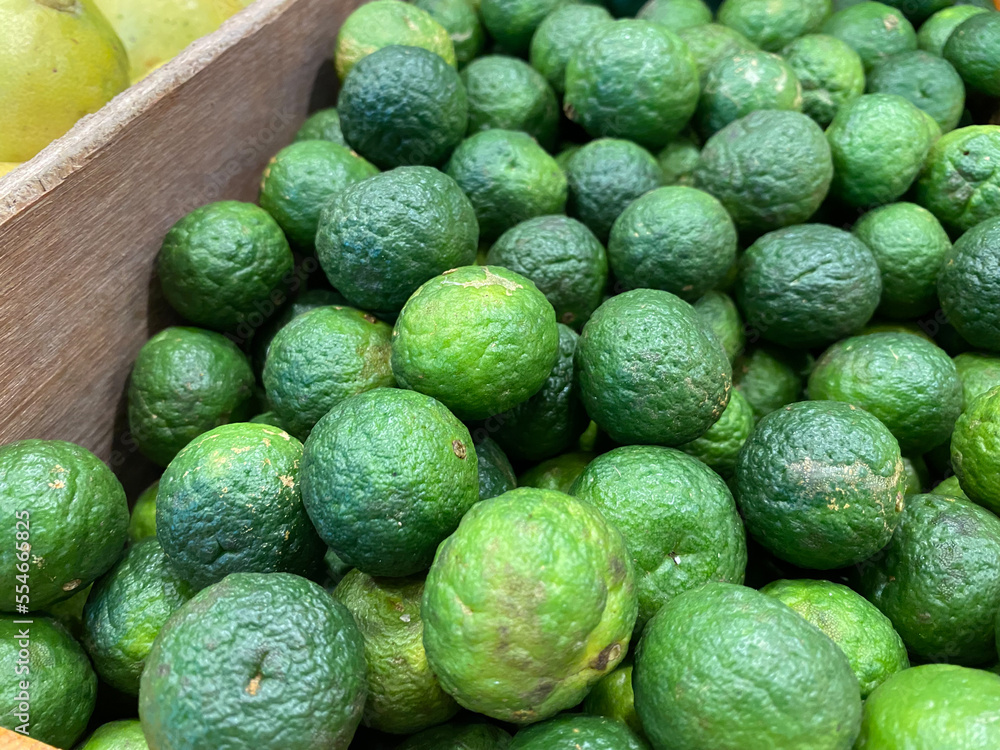 kaffir lime or jeruk purut in indonesian is type of citrus often used in asian food. very healthy and tasty kaffir lime or jeruk purut in indonesian is type of citrus often used in asian food. very healthy and tasty