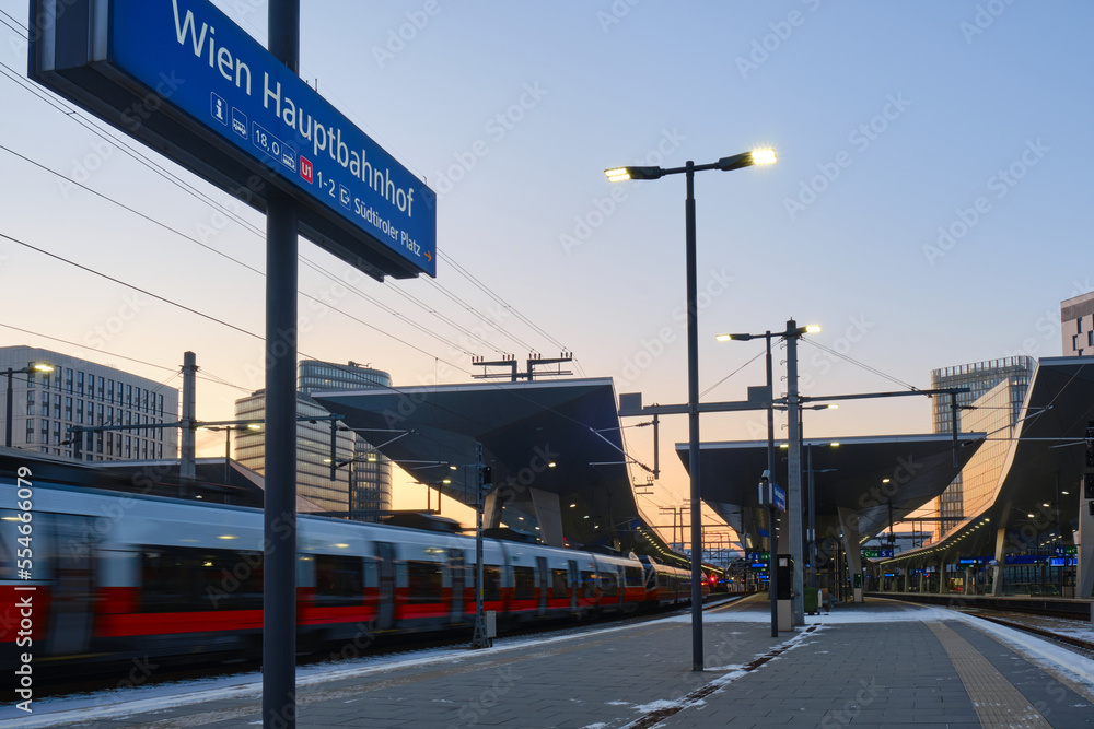Vienna central railway station Hauptbahnhof, at evening with train platforms. Wien, Austria, transport, transportation.