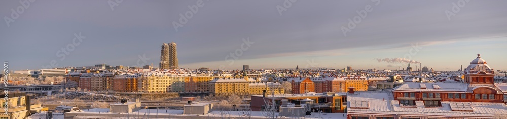 Obraz premium Panorama, the district Vasa Stan, apartment houses and skyscrapers snowy roofs a snowy blech winter day in Stockholm