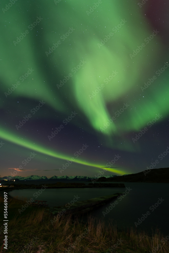 Northern lights above Seglvik, Troms, Norway with stars