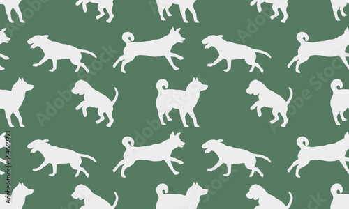 Silhouette dogs in various poses isolated on green background. Seamless pattern. Endless texture. Design for fabric  decor  wallpaper  wrapping paper.