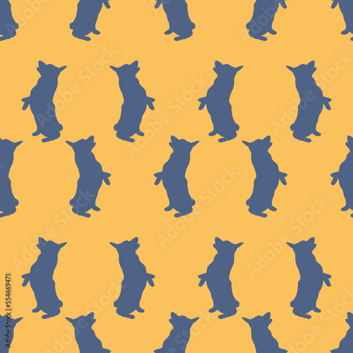 Pembroke welsh corgi puppy is standing on his hind legs. Seamless pattern. Dog silhouette. Endless texture. Design for wallpaper, fabric, template.