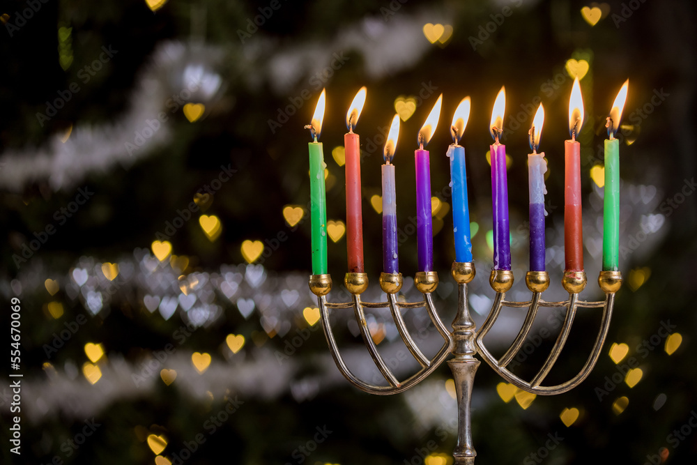 Jewish culture holiday symbol, candles are lit on Hanukkiah Menorah to