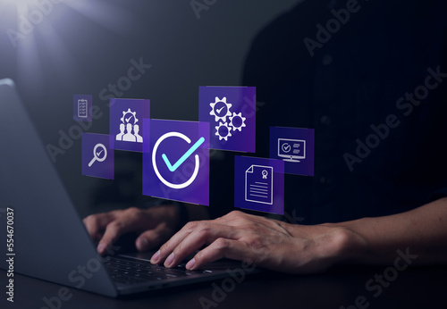 Businessman working with checkbox icon of guarantee. certification of standard of company product, ISO certification, warranty best, Standard quality control certification assurance concept.