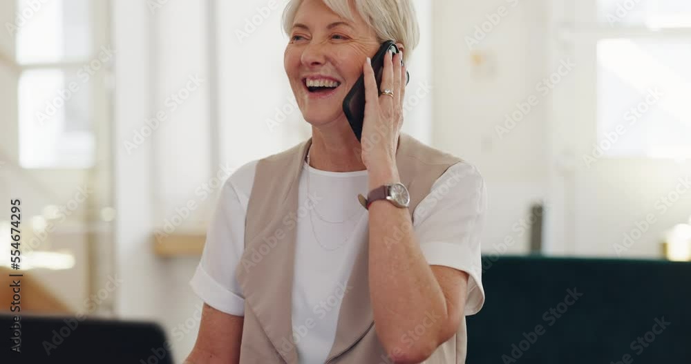 Senior woman and phone call at laptop in office with contact at professional fashion company in Canada. Happy communication and fashion designer talking to client on smartphone in workplace. Senior woman and phone call at laptop in office with contact at professional fashion company in Canada. Happy communication and fashion designer talking to client on smartphone in workplace.