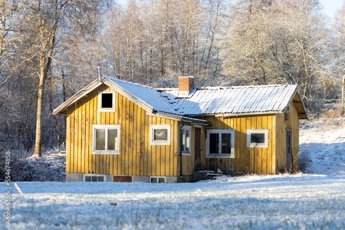 Abandoned yellow house. Winter day with snow. © Andreas Bergerstedt