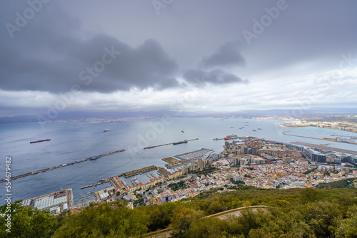 Garn panoramic view of the bay of Gibraltar with the city by the sea and boats sailing the sea.