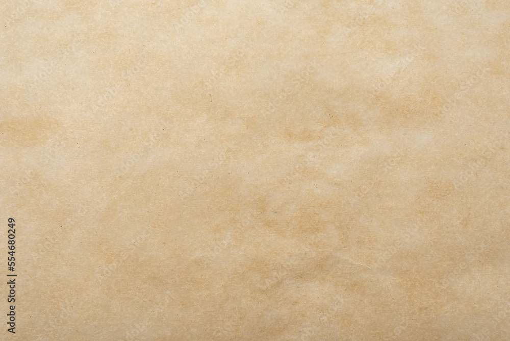 Background of brown parchment or craft paper. Old baking paper Background of brown parchment or craft paper. Old baking paper