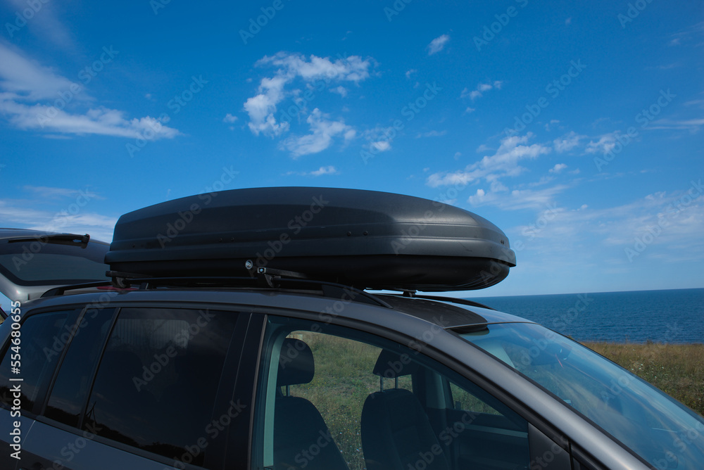 Car roof box. Box for transporting additional things on the roof of the car