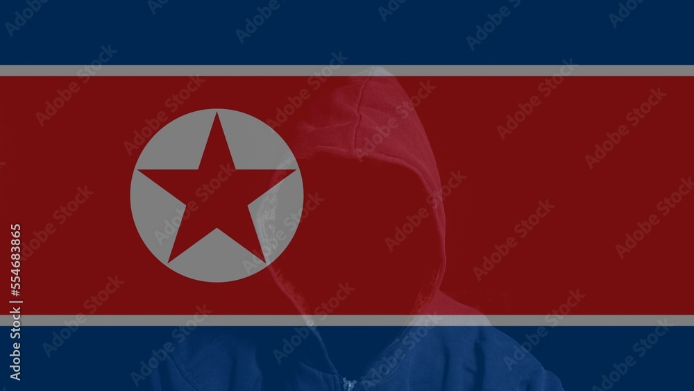 Fototapeta premium Double exposure of North Korea flag and Anonymous person in hood