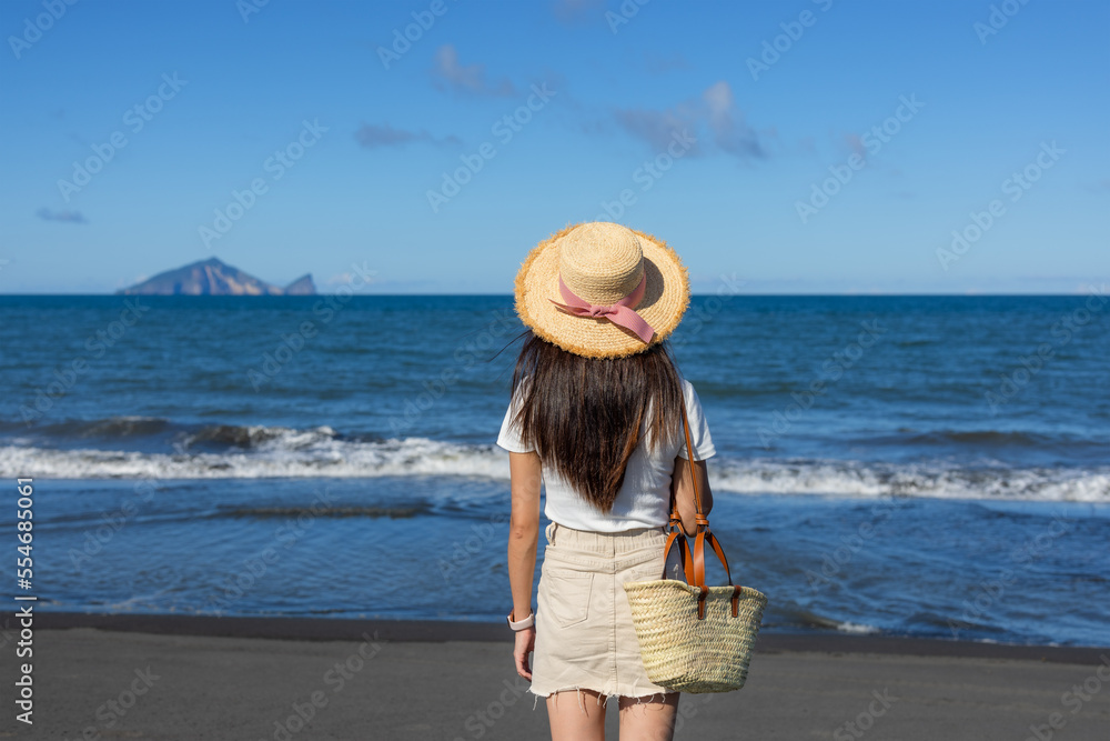 Travel woman look at the sea beach in Taiwan Yilan