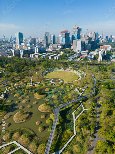 Photography Aerial view city green forest public park with modern office building Benjakitti