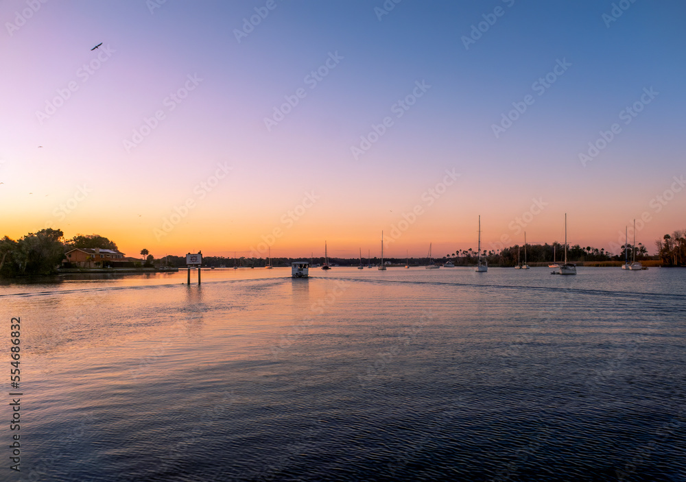 A small boat at dawn in Crystal River, Florida, USA