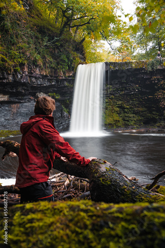 Man overlooking Sgwd Gwladys or Lady Falls along the Four Waterfalls walk  Waterfall Country  Brecon Beacons national park  South Wales  the United Kingdom.