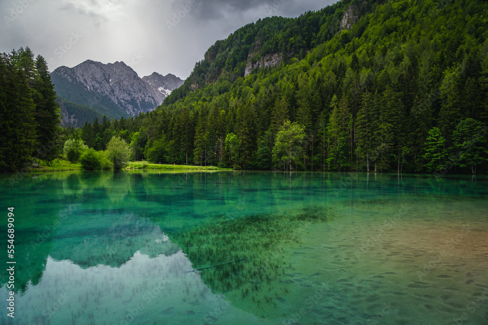 Summer scenery with mountains and turquoise lake in Slovenia