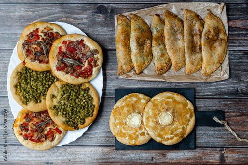 Assorted salty pastries on wooden table. Top view.  photo