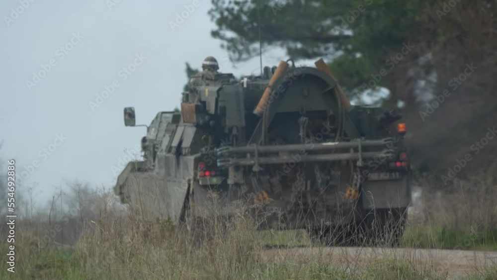 British army Challenger 2 ii CRARRV battle tank repair and recovery tank driving a mud track on a military combat exercise, Wiltshire UK British army Challenger 2 ii CRARRV battle tank repair and recovery tank driving a mud track on a military combat exercise, Wiltshire UK