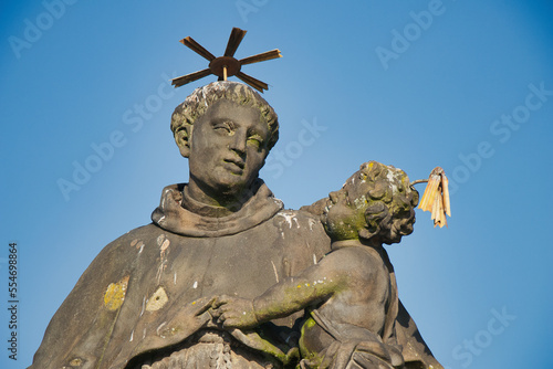 Statue of St. Anthony of Padua on Charles bridge, Prague. Czech Republic.