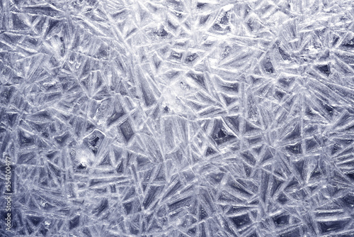 The texture of the ice surface. Winter background.