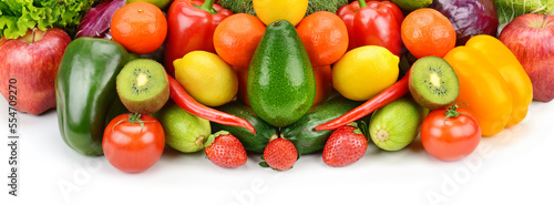 Fruits and vegetables isolated on white . Wide photo.