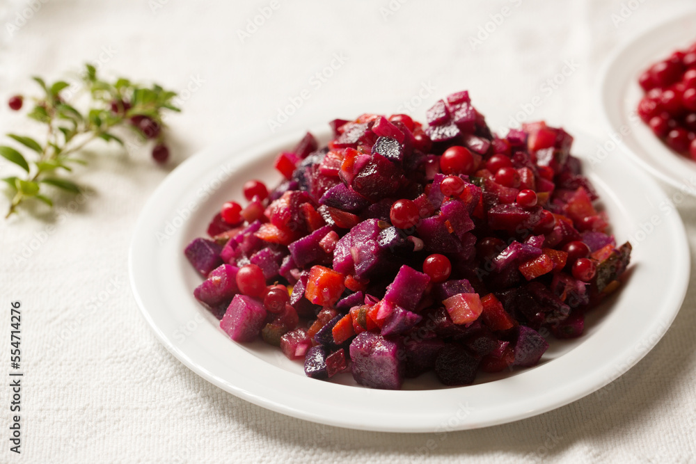 Vinaigrette salad with purple potatoes and lingonberries Vinaigrette salad with purple potatoes and lingonberries